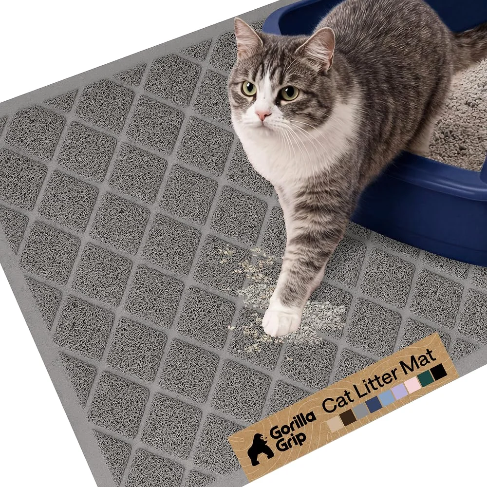 Coiled mesh across the path a cat takes out of the litter box.
